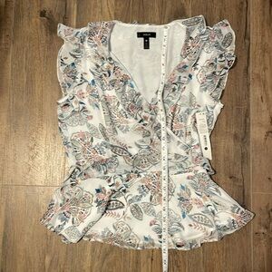 Flowing cap sleeve shirt